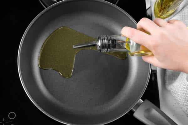 Pour  Mild Vinegar Into Your Cookware